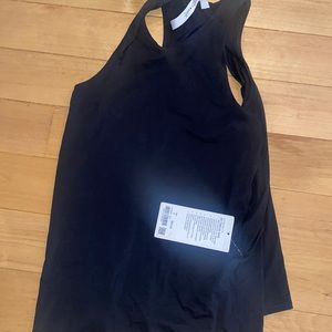 Lululemon “all tied up” tank- never been worn! Size 6